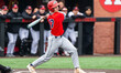 James Schaffer, 17, of the Stony Brook Seawolves swings the bat during an NCAA baseball ga...