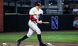 CHASE KREWSON (5) of the Rutgers Scarlet Knights swings the bat during an NCAA baseball ga...