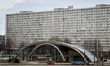 The Superjednostka residential block is seen from the area near Spodek, with Rondo Sztuki...