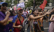 Women and supporters gather in Sao Paulo, Brazil, on International Women's Day for a demon...