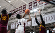Hassan Koureissi shoots a layup during the Catholic High School Athletic Association Champ...