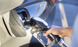 A person pumps gasoline into a vehicle at a gas station in Alexandria, Virginia, USA, on M...