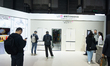 Fairgoers are seen at the LG booth at the SNEIC expo center in Shanghai, China, on March 1...