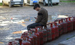 A man is pictured at a gas agency amid LPG gas shortage fears in India linked to the ongoi...