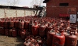 Domestic empty gas cylinders are at a gas agency in Sopore, Jammu and Kashmir, India, on M...