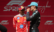 Scuderia Ferrari HP driver #44 Lewis Hamilton (GBR) shares a laugh with Mercedes-AMG Petro...