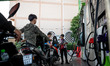 People line up to refuel their motorcycles at a Bangchak Corporation Public Company Limite...