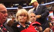 Delegates recieve red "Make America Great Again" hats during the Republican National Conve...