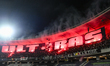 Fans of Universitatea Cluj attend the Romania Superliga playoff match between Universitate...