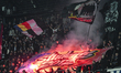 Fans of Universitatea Cluj attend the Romania Superliga playoff match between Universitate...