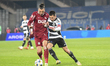 Karlo Muhar and Ovidiu Alexandru Bic play during the Romania Superliga playoff match betwe...