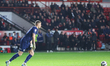 Cambridge United's goalkeeper Jake Eastwood prepares to kick the ball forward during the S...