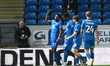 Kyrell Lisbie of Peterborough United celebrates after scoring the team's first goal during...