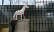 British artist Damien Hirst poses with his artwork 'Myth' during a press preview of his so...