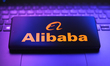 The Alibaba logo appears on a smartphone screen in Ontario, Canada, on March 18, 2026. (Ph...