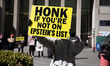 Members of the activist group Rise and Resist and their supporters gather for a weekly pro...