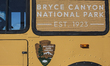 A detail view of the National Park Service logo on a shuttle bus at Bryce Canyon National...
