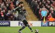 Liverpool goalkeeper Alisson Becker in action with the ball during the UEFA Champions Leag...