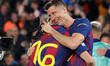 Robert Lewandowski and Fermin Lopez celebrate during the match between FC Barcelona and Ne...