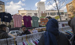 Iranian women shop for dresses from a street vendor during New Year shopping in northern T...