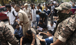 Students of Cotton University clash with police and security personnel during a protest de...