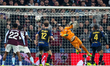 Lille OSC's goalkeeper, Berke Ozer, makes a save during the UEFA Europa League Round of 16...