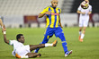 Yacine Brahimi (left) of Al-Gharafa SC and Ahmed Reyad Elmawla of Al-Ahli SC in action dur...