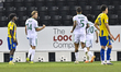 Michel Vlap (second from left) of Al-Ahli SC celebrates after scoring a goal during the Qa...