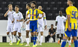 Michel Vlap (left) of Al-Ahli SC celebrates after scoring a goal during the Qatar Stars Le...