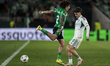 Hector Bellerin of Real Betis competes for the ball with Vicente Taborda of Panathinaikos...