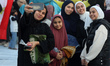 People celebrate Eid al-Fitr, marking the end of the holy fasting month of Ramadan, in Gaz...