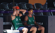 Lubos Nemec and Adrian Petruf of Slovakia rest during the qualifying round match against N...