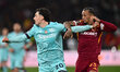 Nadir Zortea of Bologna F.C. and Wesley of A.S. Roma are in action during the UEFA Europa...