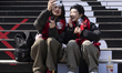 Fans of K-pop group BTS gather on the steps of the Sejong Center for the Performing Arts a...