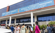 People gather outside the Office of the District Commissioner, Kamrup Metropolitan Distric...