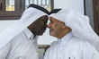 Qataris exchange greetings after Eid al-Fitr prayers on the first day of the Eid al-Fitr h...