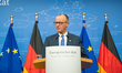 German Chancellor Friedrich Merz speaks during a press conference at the European Council...