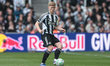 Dennis Cirkin of Sunderland with the ball during the Premier League match between Newcastl...