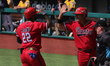 Rodolfo Bone #22 of Managua Dantos celebrates after scoring a run during the first game of...