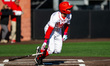 Chase Krewson of the Rutgers Scarlet Knights swings the bat during an NCAA baseball game a...