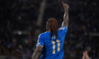 Moise Kean in action at Gewiss Stadium in Bergamo, Italy, during the match between Italy a...