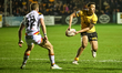 Daejarn Ali makes a pass during the BetFred Super League match between Castleford Tigers a...