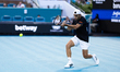 Francisco Cerundolo of Argentina returns a shot against Alexander Zverev of Germany during...