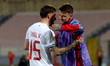 Vincent Thill of Luxembourg celebrates scoring the 0-1 goal with his brother Sebastien Thi...