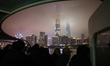 People are seen on a ferry on the Huangpu River in Shanghai, China, on March 17, 2026. 