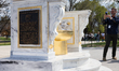 A “Throne Fit for a King,” with a golden toilet in the center, sits on the National Mall,...