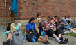 Pilgrims stop for a break in Mrowla, during the 1st 32km stage of the Rzeszow-Kamionka as...