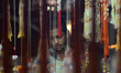 An Indian boy looks for Rakhi or secred thread in a local temporary shop, on the eve of 'R...
