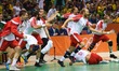 Denmark's players celebrate after the men's gold medal match of Handball between France an...