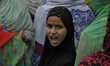 A kashmiri Muslim Girl shouts Anti-India Slogans during a protest  in srinagar on August 2...